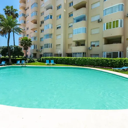 With Terrace And Pools In The Port * Estepona