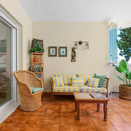 With Terrace And Pools In The Port Estepona